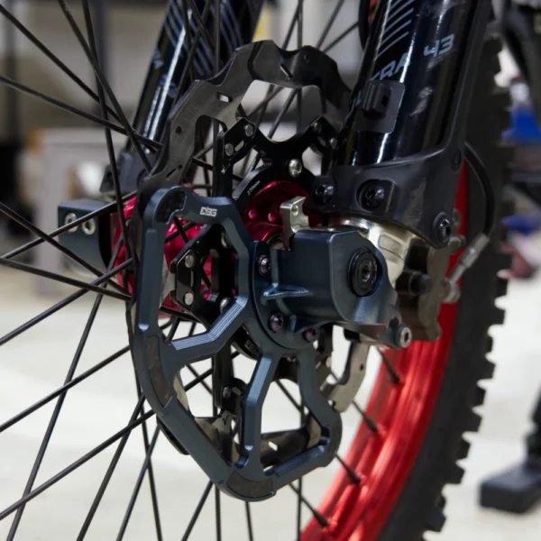 Rotor guard installed on Surron Ultra Bee with RFloXa Ultra43 fork – Gunmetal Blue