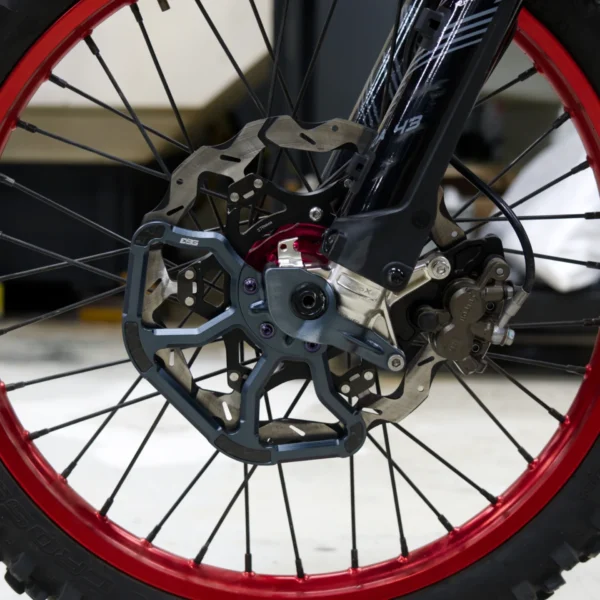 EBG front rotor guard on Surron Ultra Bee front wheel, RFloXa Ultra43 fork – Gunmetal Blue