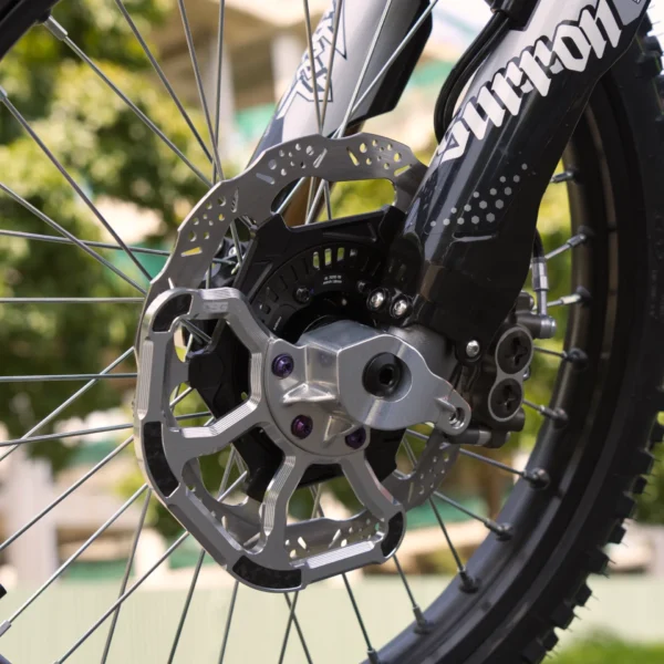 Surron Light Bee 2 240mm front rotor close-up on the bike